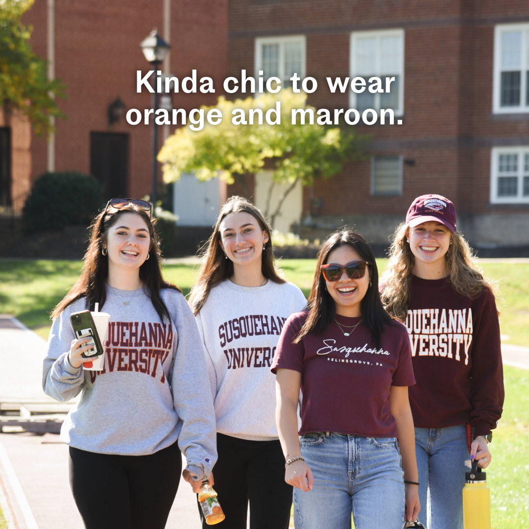 Susquehanna students wearing orange and maroon